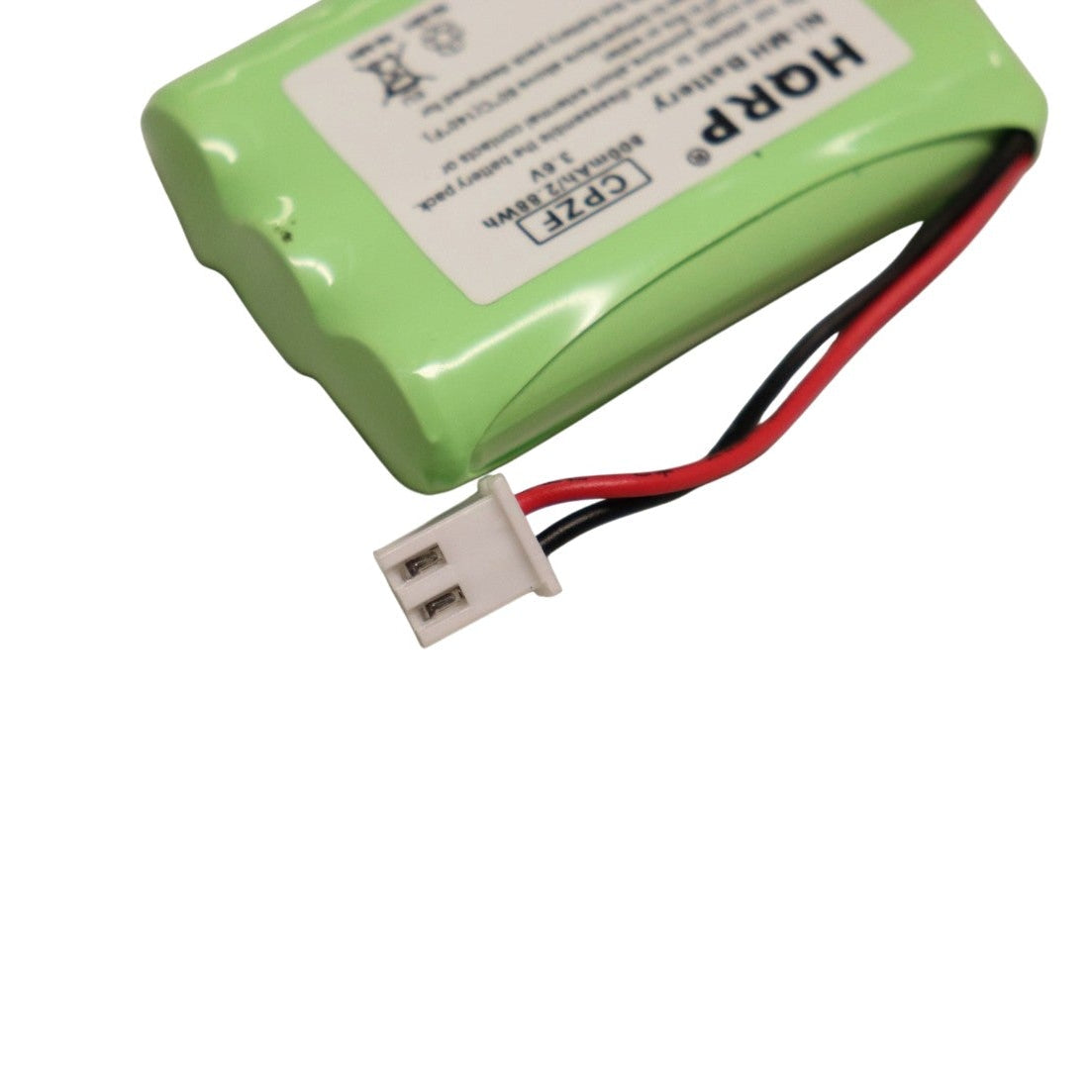 Close-up of HQRP Tri-Tronics XLS receiver replacement battery showing two-pin connector and red and black battery wires